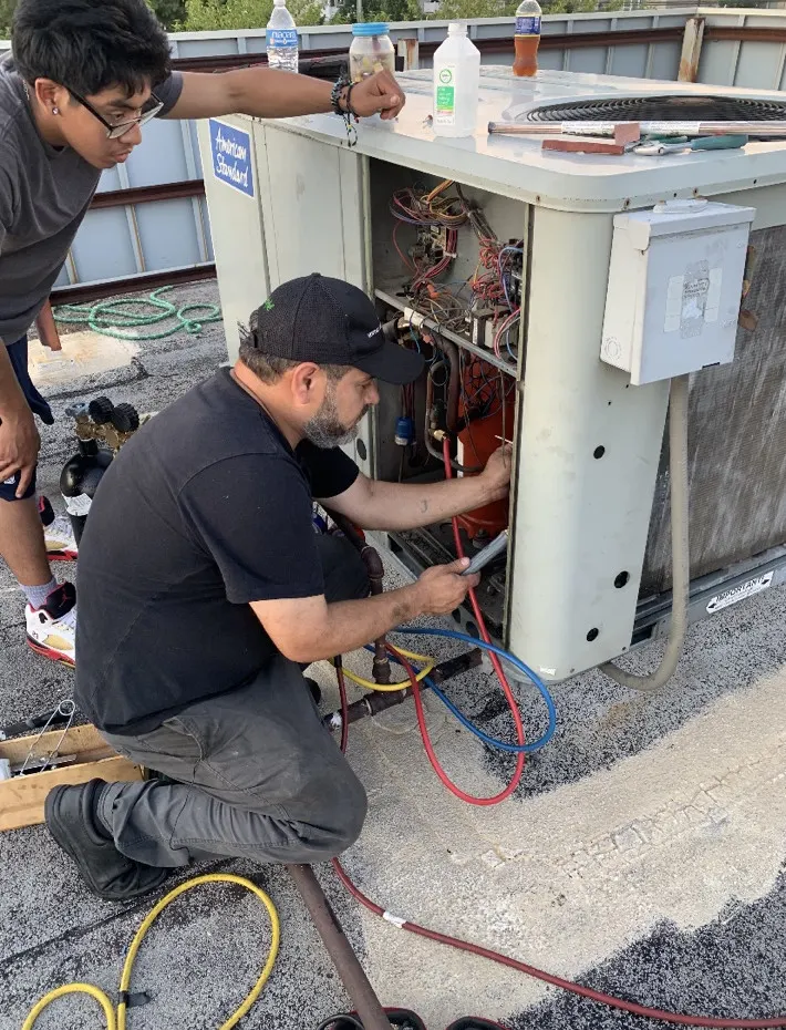 Rooftop condensing unit repair by J and G Refrigeration technicians in Northern Illinois