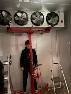 Installing a four-fan evaporator inside a walk-in cooler